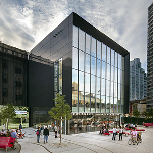 A large building with one side all glass windows